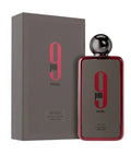 Aflnan 9PM Rebel perfume bottle with sleek black and gold design, showcasing the 50Scents fragrance for men.